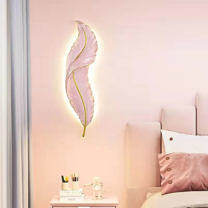 Pink feather wall light to decorate the comfortable bedroom